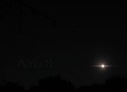 Левее луны, вверх - видна Венера.