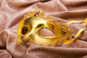 3408437-953270-golden-mask-on-the-satin-background